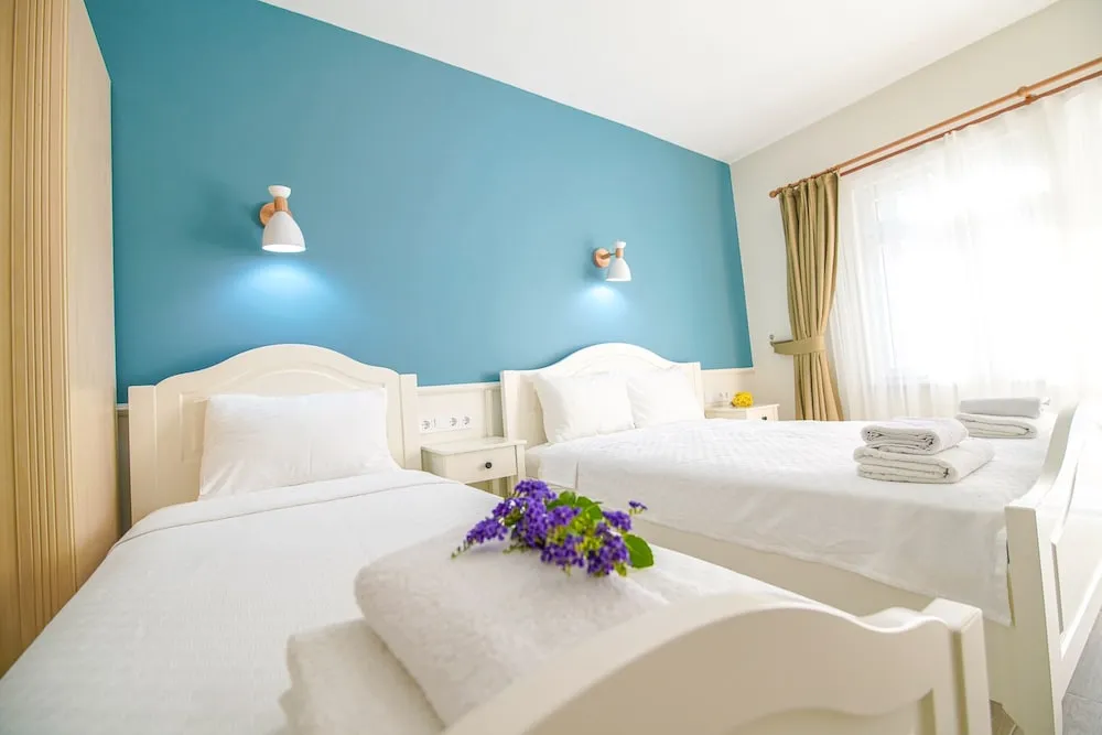 Deluxe Üç Kişilik Oda