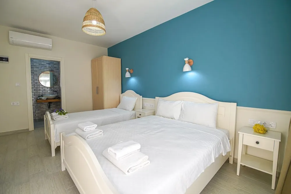 Deluxe Üç Kişilik Oda
