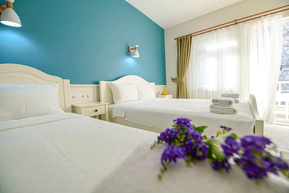Deluxe Üç Kişilik Oda