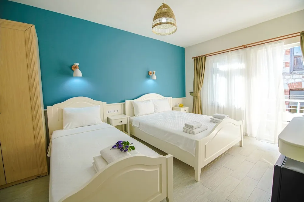 Deluxe Üç Kişilik Oda