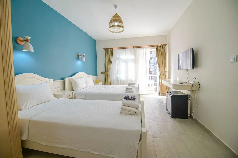 Deluxe Üç Kişilik Oda