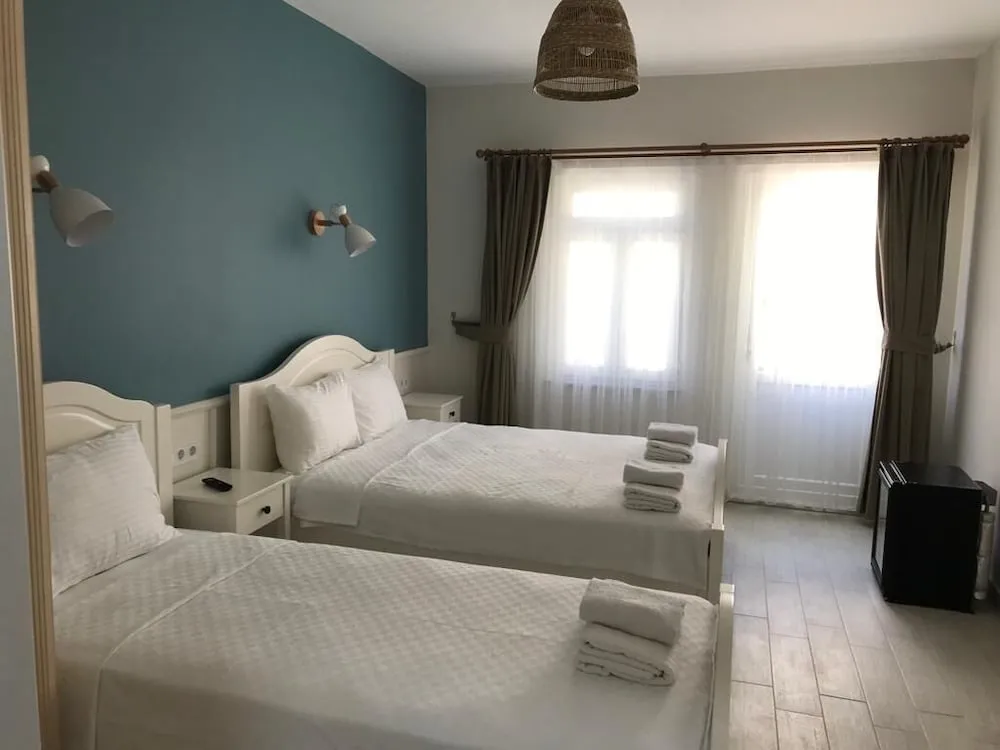 Deluxe Üç Kişilik Oda