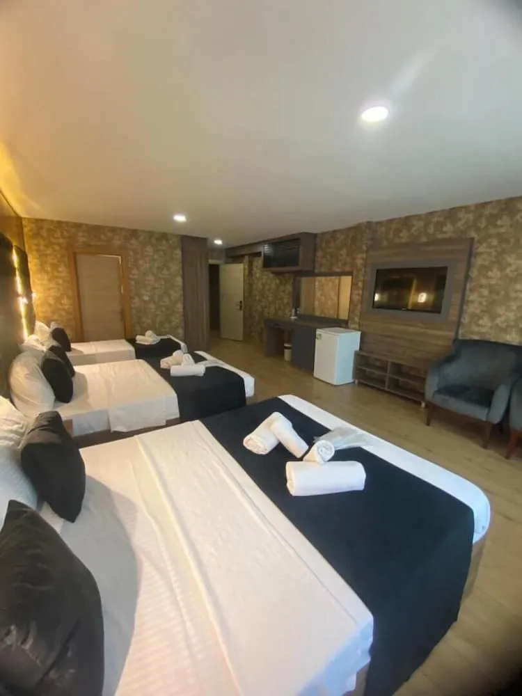 Deluxe Üç Kişilik Oda