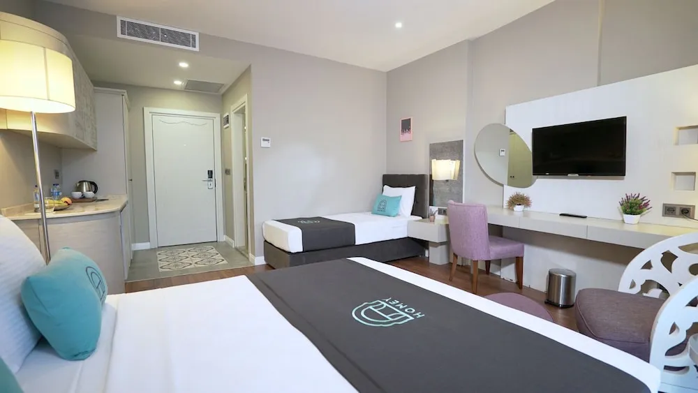 Family Tek Büyük veya İki Ayrı Yataklı Oda