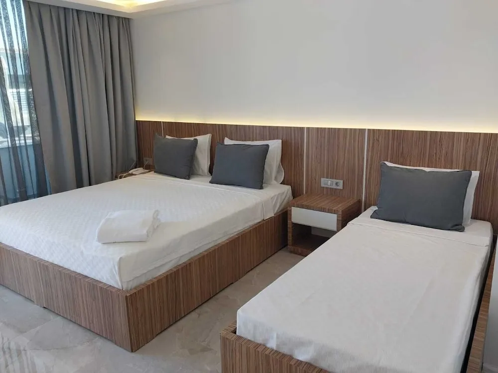 Deluxe Üç Kişilik Oda, Birden Çok Yatak