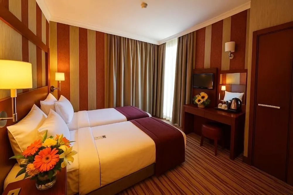Deluxe İki Ayrı Yataklı Oda (French Bed )
