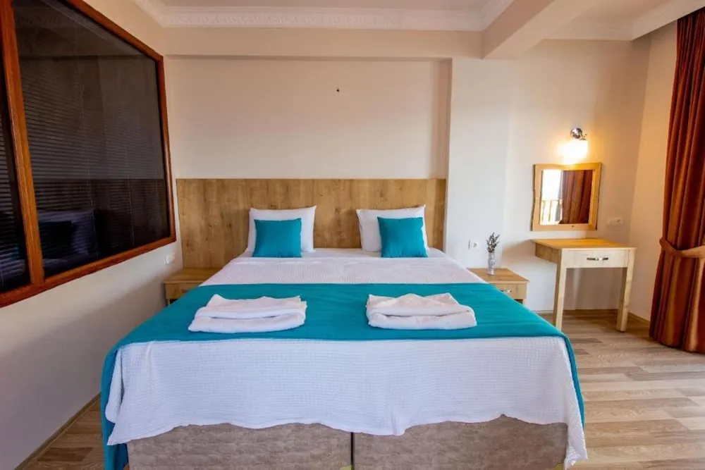 Deluxe Üç Kişilik Oda