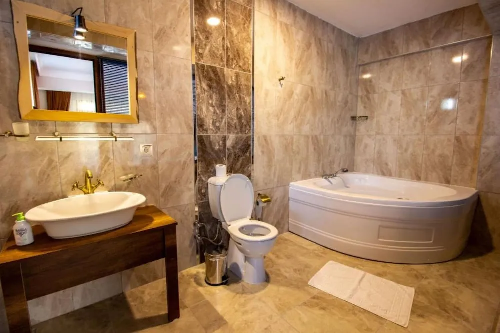 Deluxe Üç Kişilik Oda