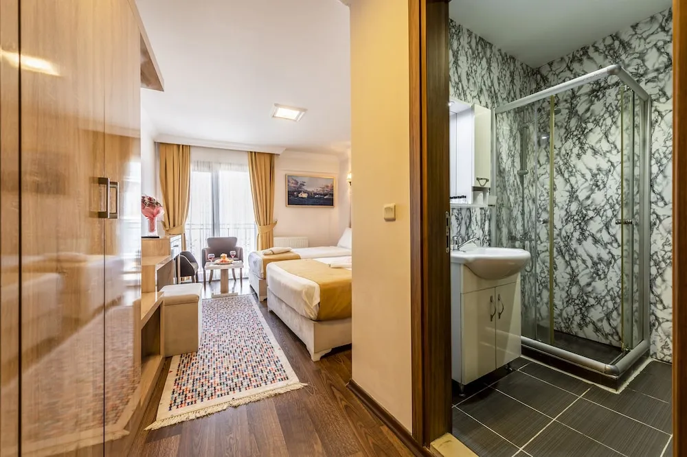 Deluxe Üç Kişilik Oda