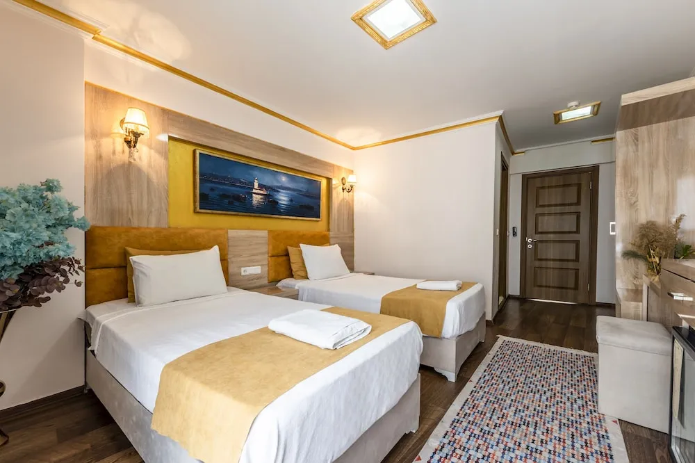 Deluxe Üç Kişilik Oda