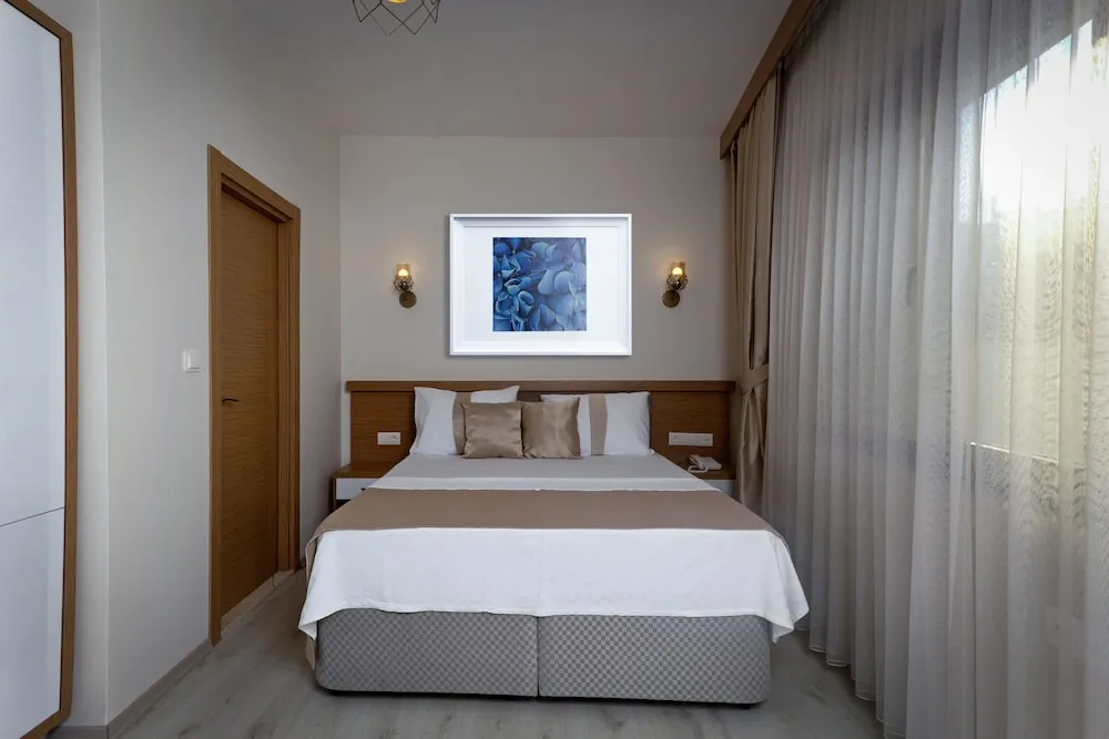 Economy Üç Kişilik Oda