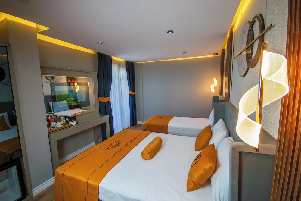 Deluxe Üç Kişilik Oda