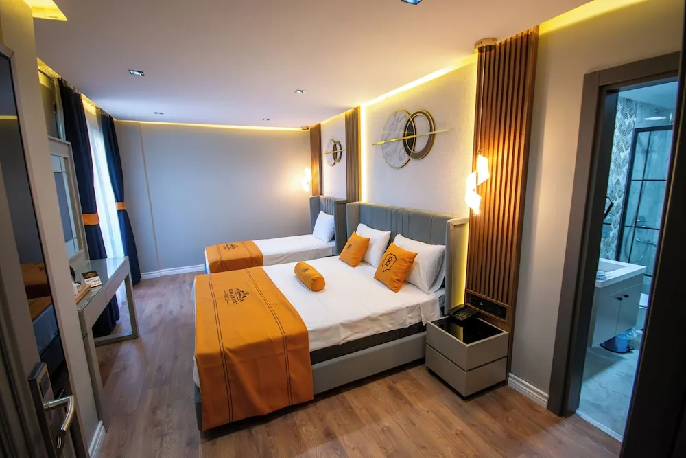 Deluxe Üç Kişilik Oda