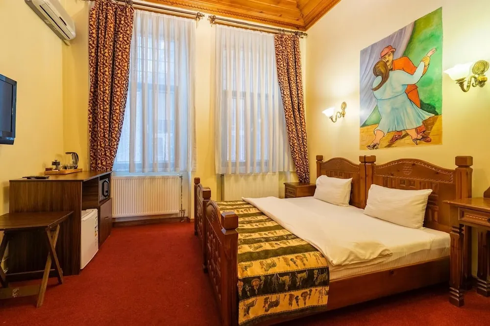 Deluxe Tek Büyük veya İki Ayrı Yataklı Oda