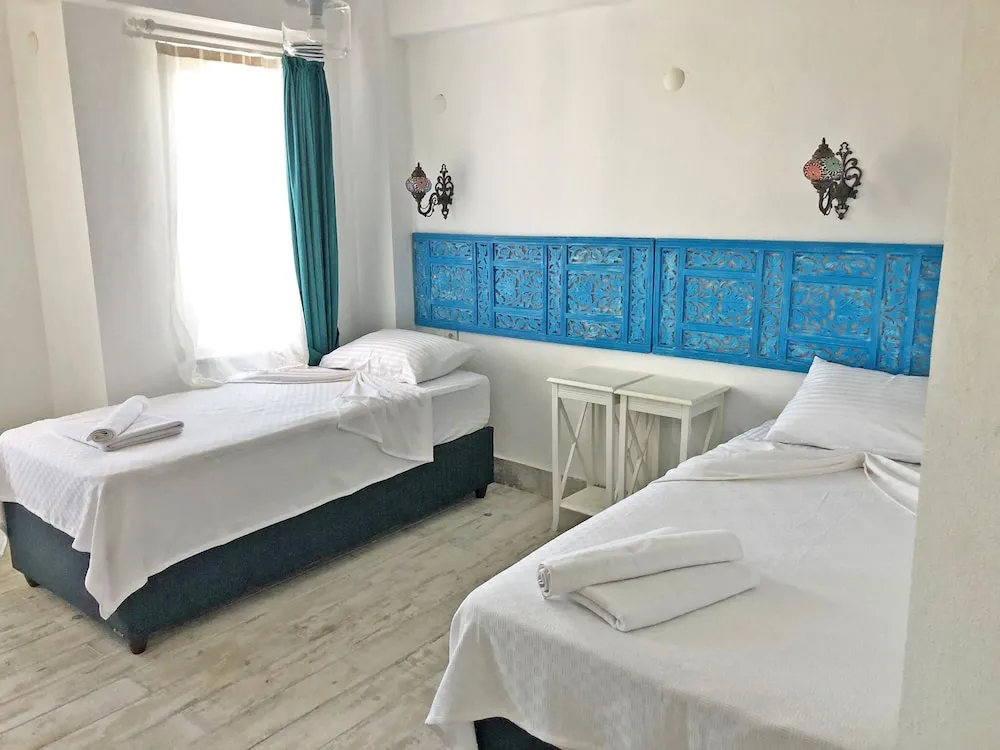 Deluxe Dört Kişilik Oda, Bahçe Manzaralı