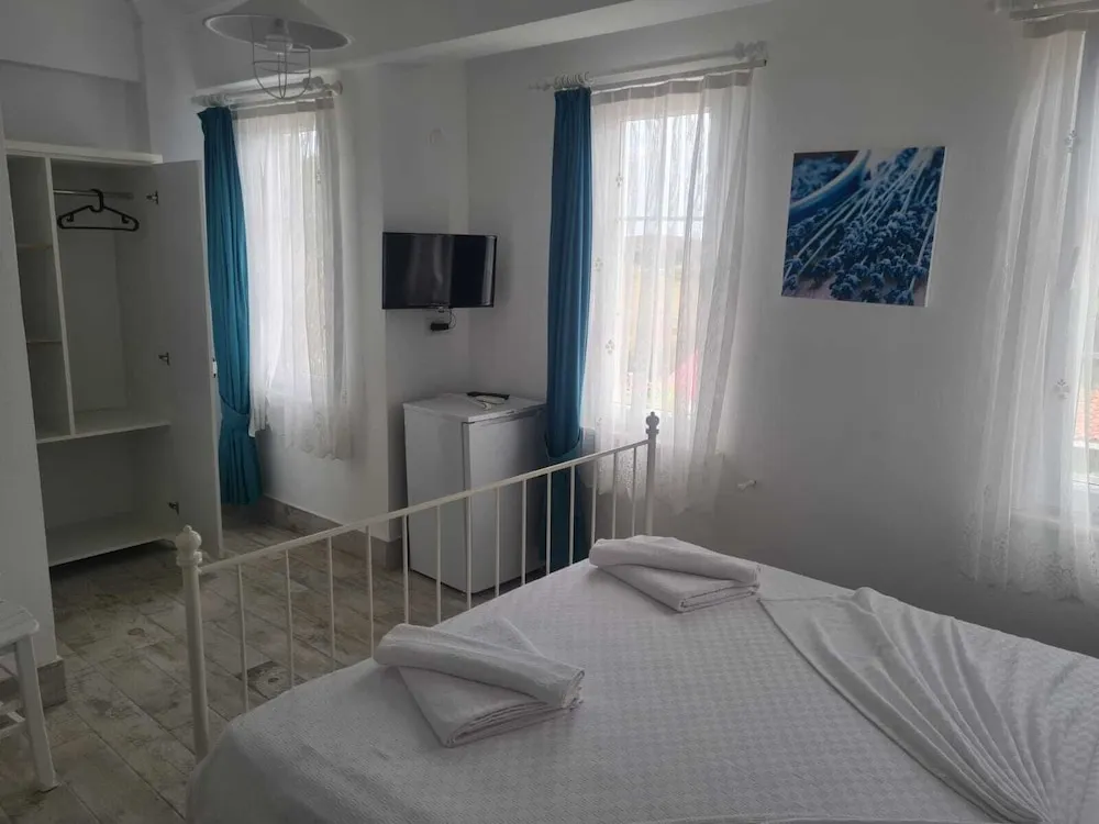 Deluxe Üç Kişilik Oda, Bahçe Manzaralı