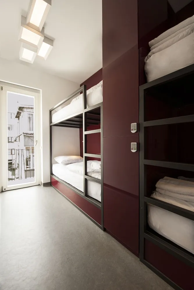 Bed in 4-Bed Dormitory Room with Shared Bathroom