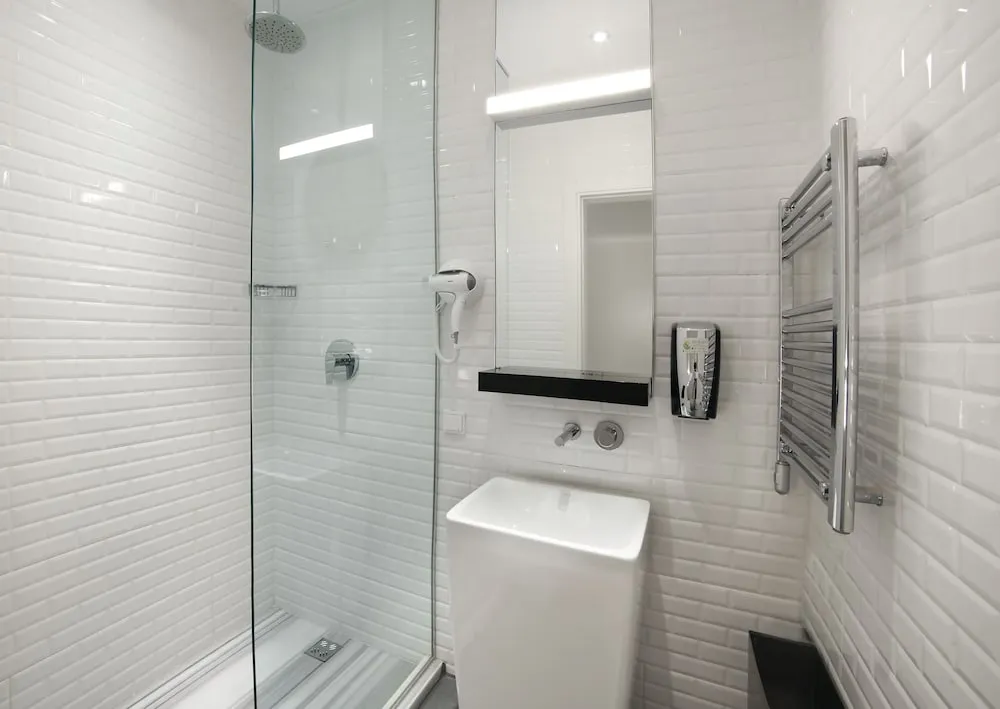 Bed in 4-Bed Dormitory Room with Shared Bathroom
