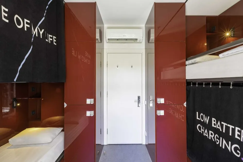 Bed in 4-Bed Dormitory Room with Shared Bathroom