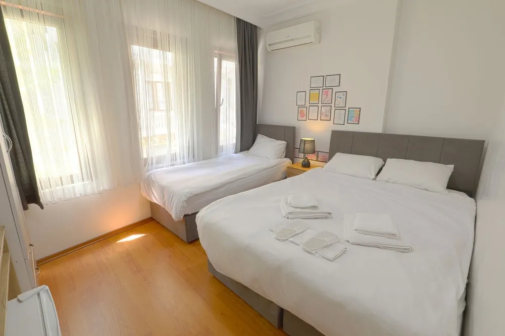 Üç Kişilik Oda, Şehir Manzaralı