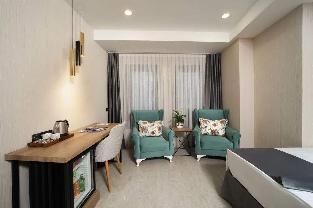 Deluxe Üç Kişilik Hamamlı Oda