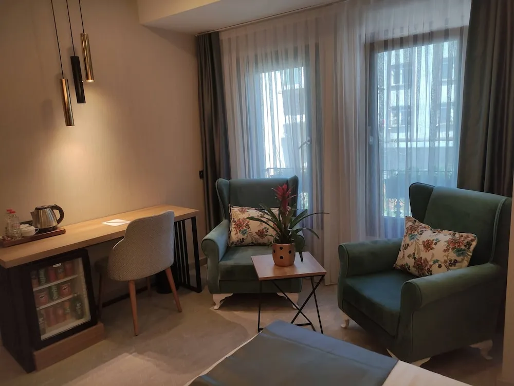 Deluxe Üç Kişilik Hamamlı Oda