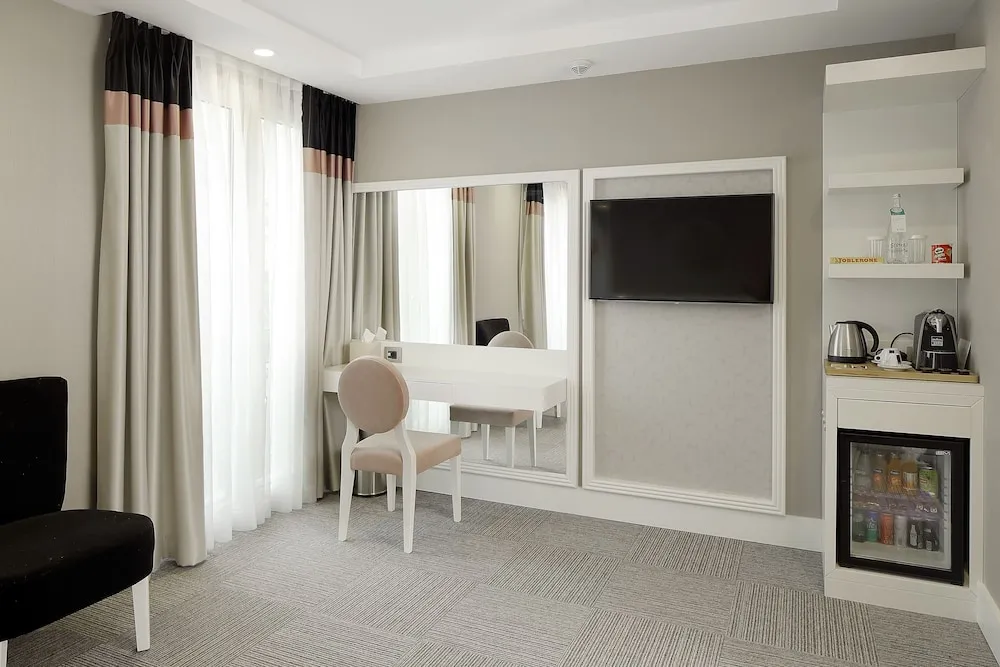 Deluxe Tek Büyük veya İki Ayrı Yataklı Oda