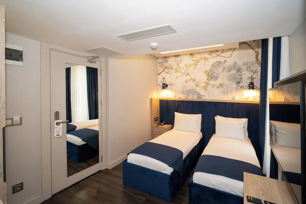 Premium Tek Büyük veya İki Ayrı Yataklı Oda