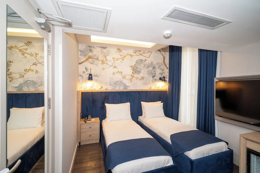 Premium Tek Büyük veya İki Ayrı Yataklı Oda