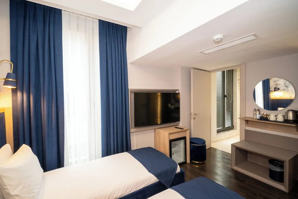 Premium Tek Büyük veya İki Ayrı Yataklı Oda