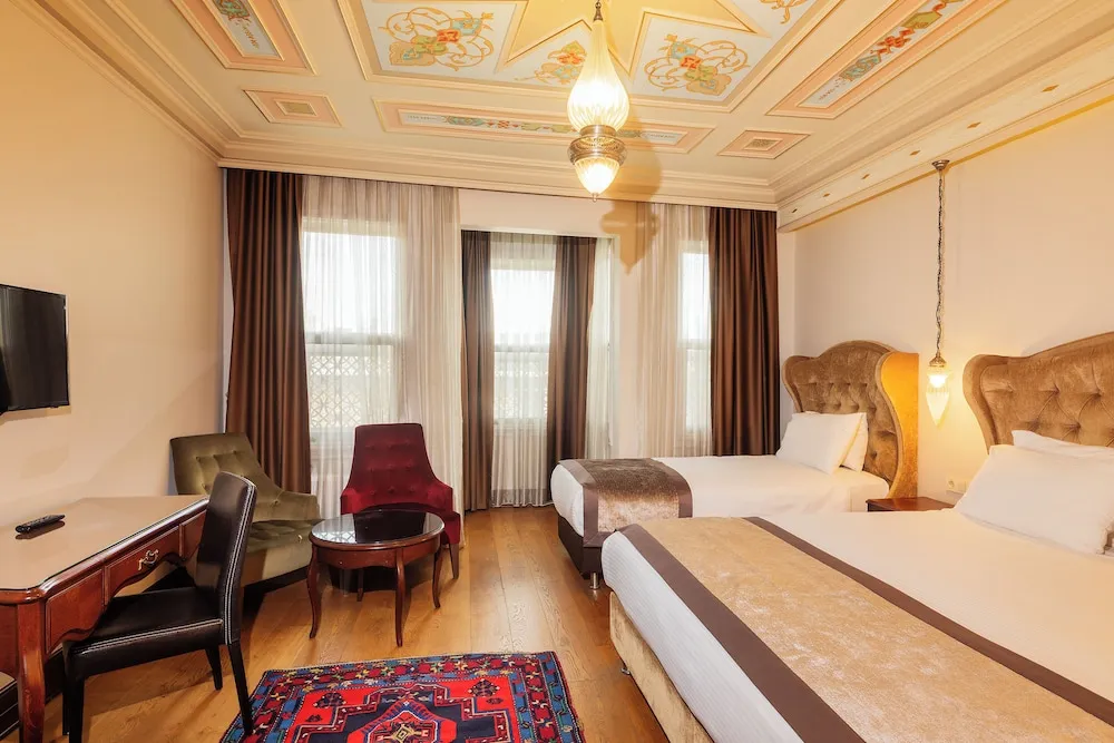 Deluxe Üç Kişilik Oda