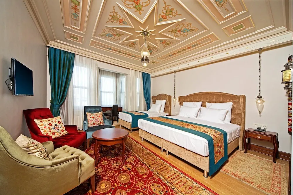 Deluxe Üç Kişilik Oda