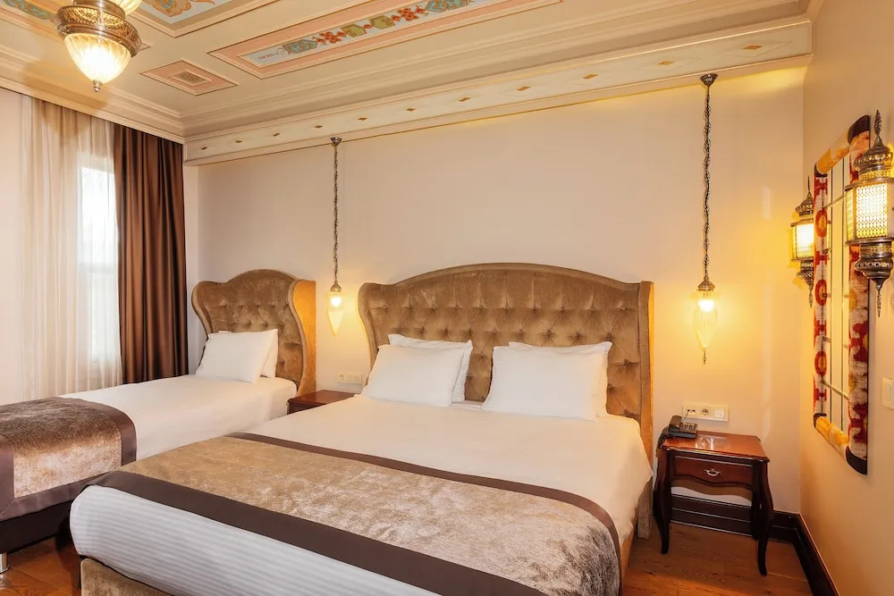 Deluxe Üç Kişilik Oda