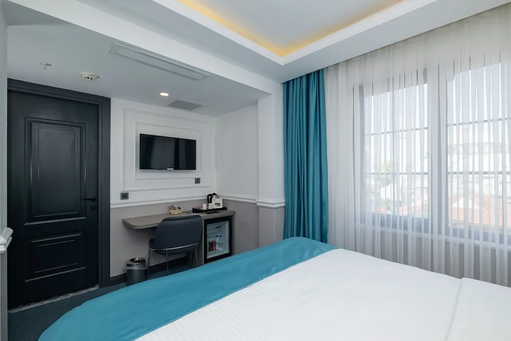 Deluxe Tek Büyük Yataklı Oda
