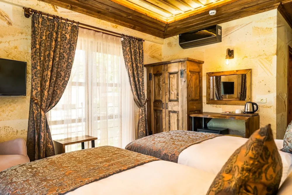 Deluxe Tek Büyük veya İki Ayrı Yataklı Oda