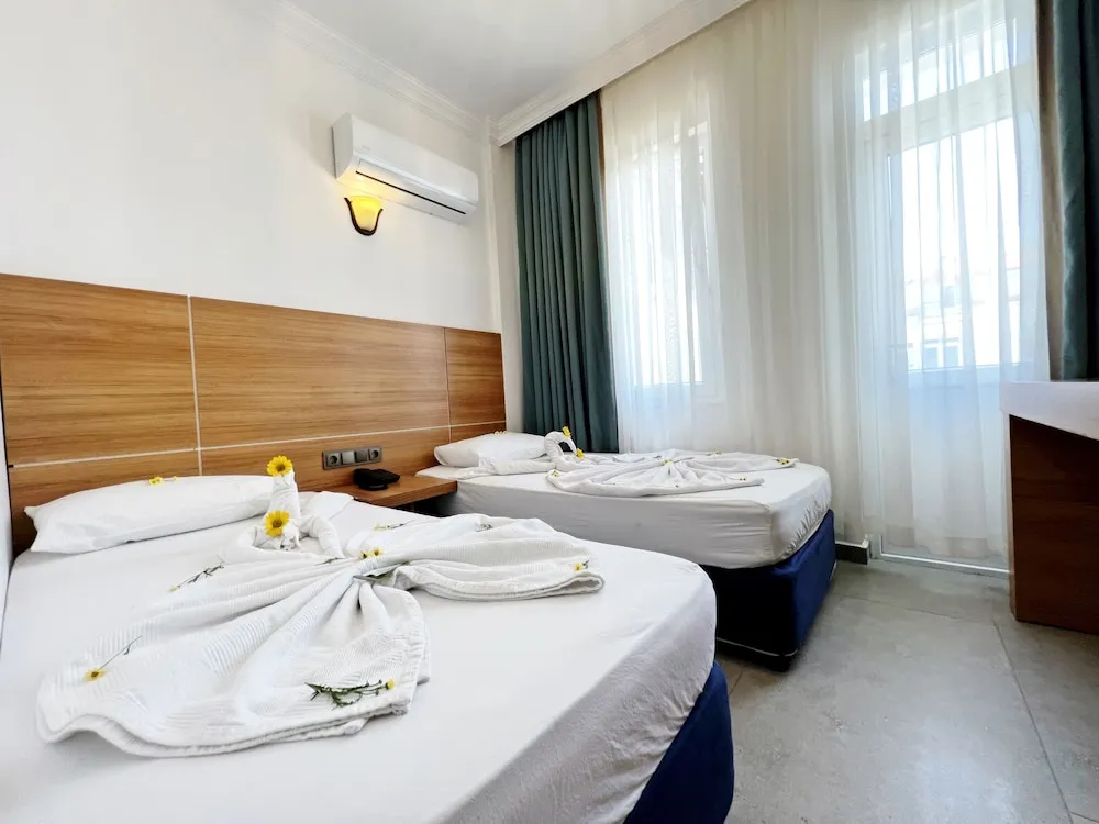 Comfort Tek Büyük veya İki Ayrı Yataklı Oda