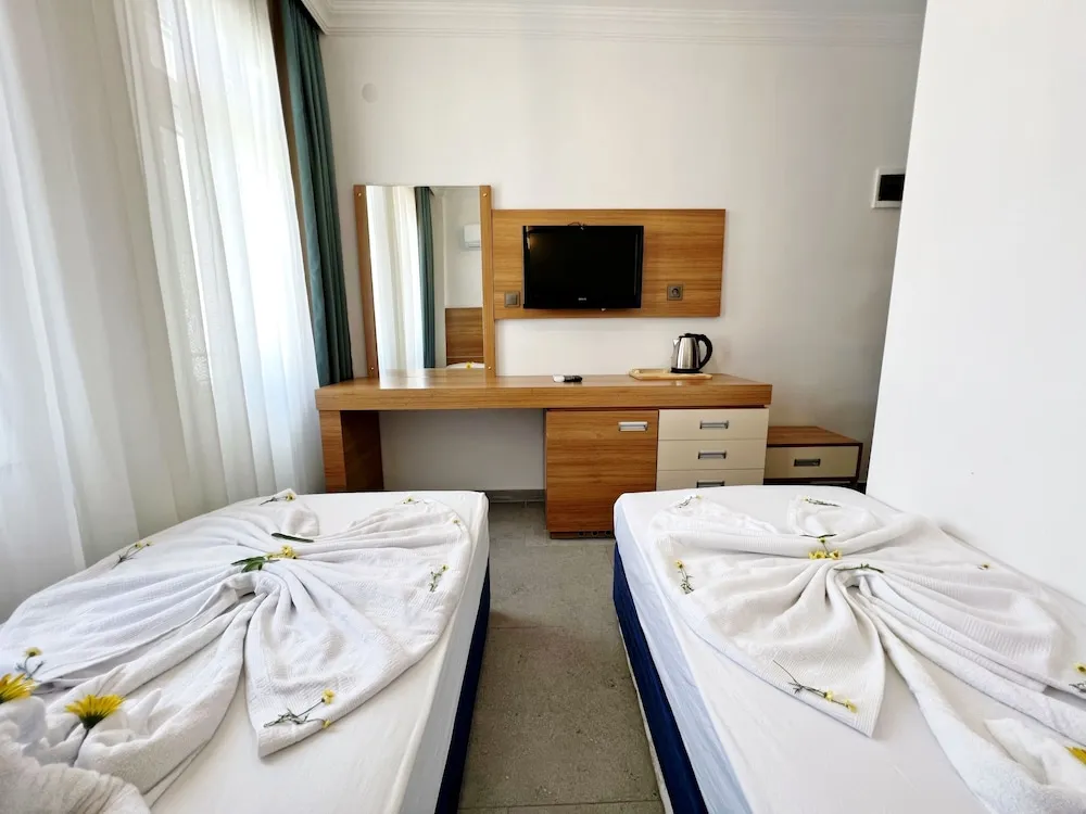 Comfort Tek Büyük veya İki Ayrı Yataklı Oda