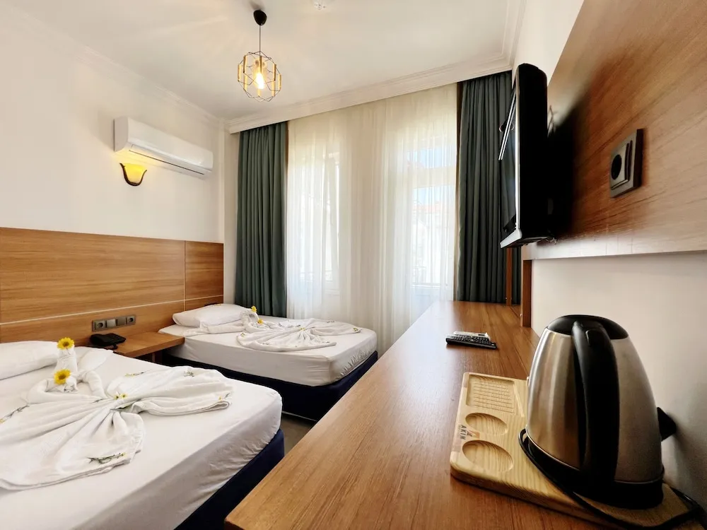Comfort Tek Büyük veya İki Ayrı Yataklı Oda