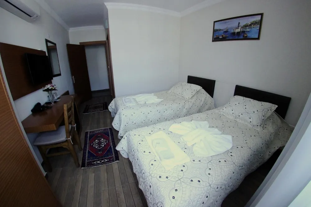 Economy Tek Büyük veya İki Ayrı Yataklı Oda