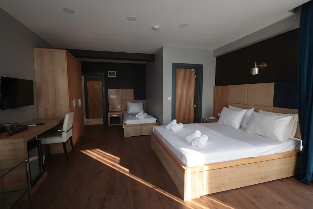 Deluxe Üç Kişilik Oda