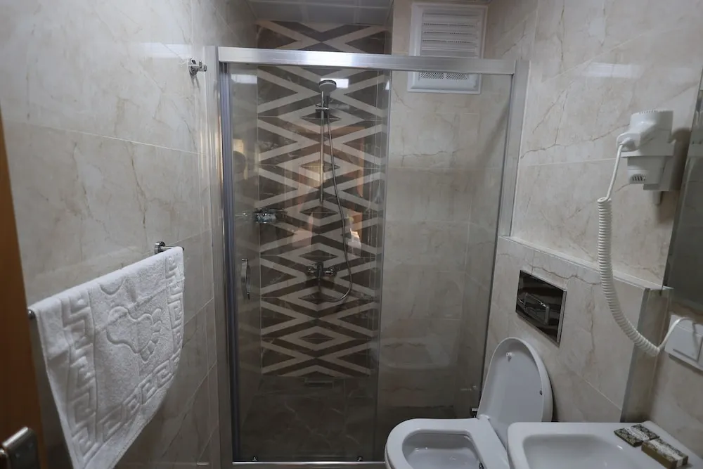 Deluxe Üç Kişilik Oda
