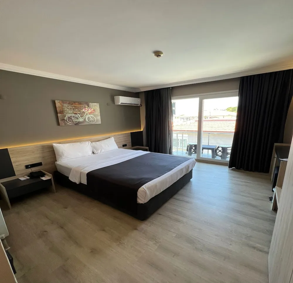 Deluxe Tek Büyük veya İki Ayrı Yataklı Oda