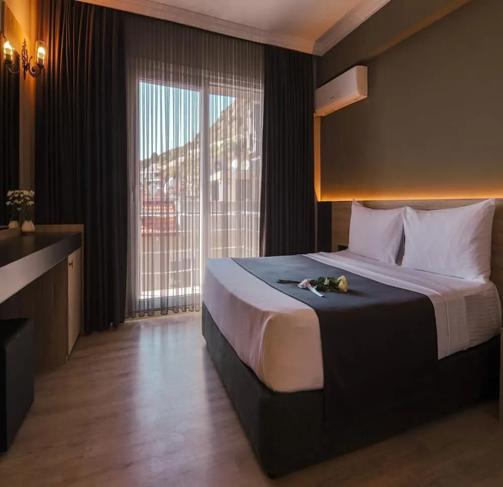 Deluxe Tek Büyük veya İki Ayrı Yataklı Oda