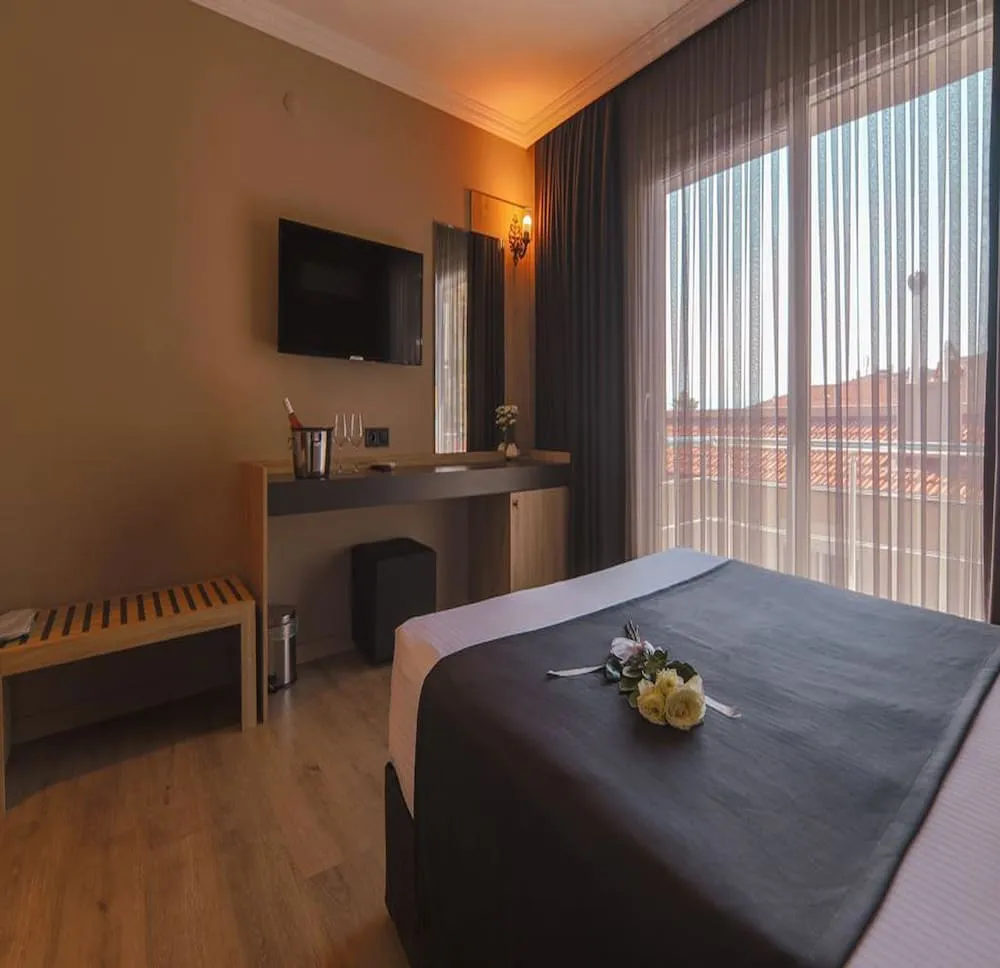 Deluxe Tek Büyük veya İki Ayrı Yataklı Oda