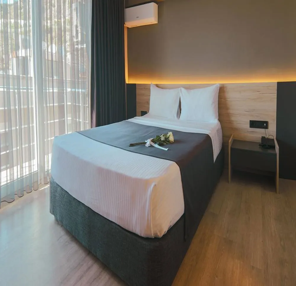 Deluxe Tek Büyük veya İki Ayrı Yataklı Oda