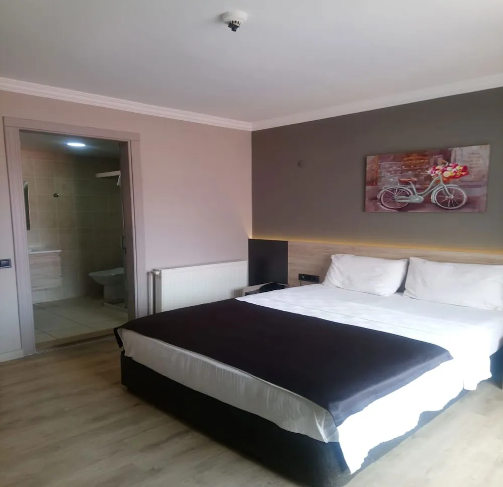 Deluxe Tek Büyük veya İki Ayrı Yataklı Oda