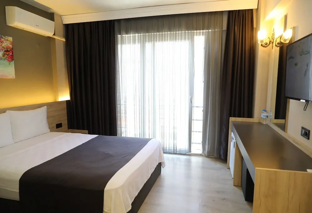 Deluxe Tek Büyük veya İki Ayrı Yataklı Oda