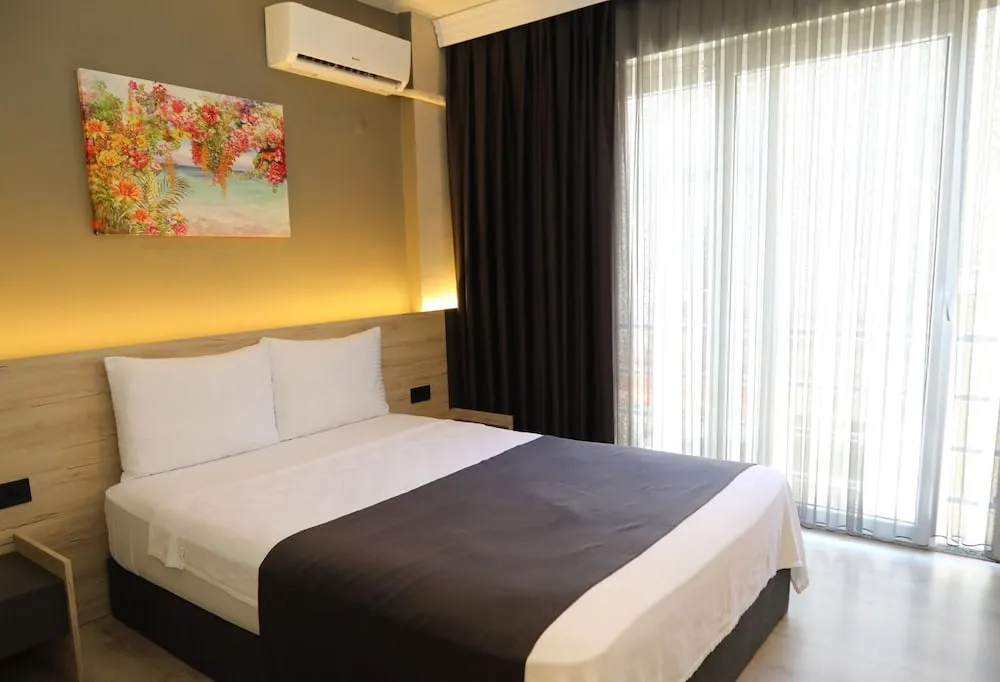 Deluxe Tek Büyük veya İki Ayrı Yataklı Oda