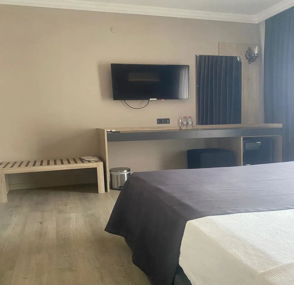 Deluxe Tek Büyük veya İki Ayrı Yataklı Oda