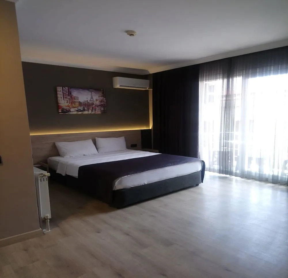 Deluxe Tek Büyük veya İki Ayrı Yataklı Oda